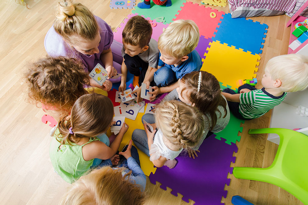 group of kids with their aba therapist